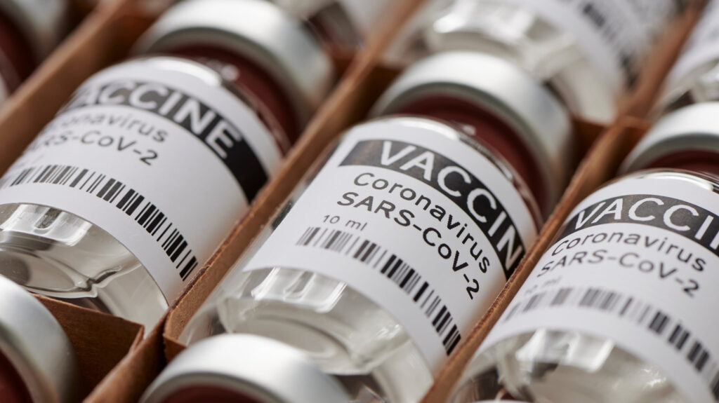 Coronavirus,Vaccine.,Sars-cov-2,Covid-19.,Some,Ampoules,With,Ncov-2019,Vaccine,In